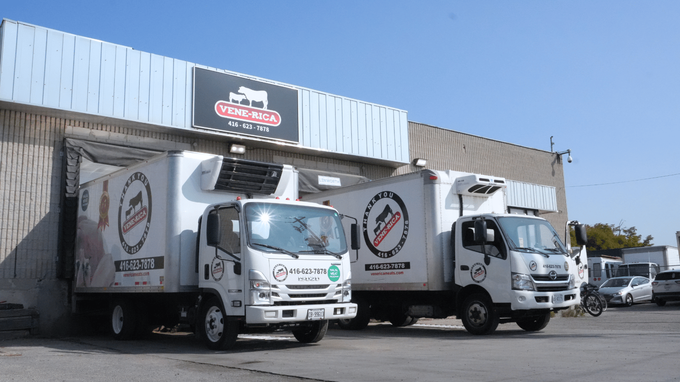 Venerica branded delivery trucks parked outside the Toronto facility